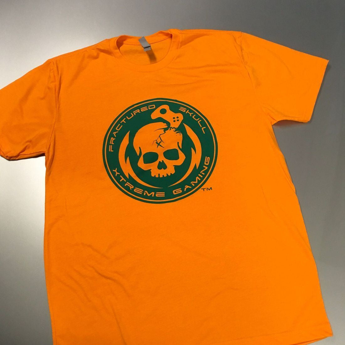 Fractured Skull Xtreme Green on Orange Tee